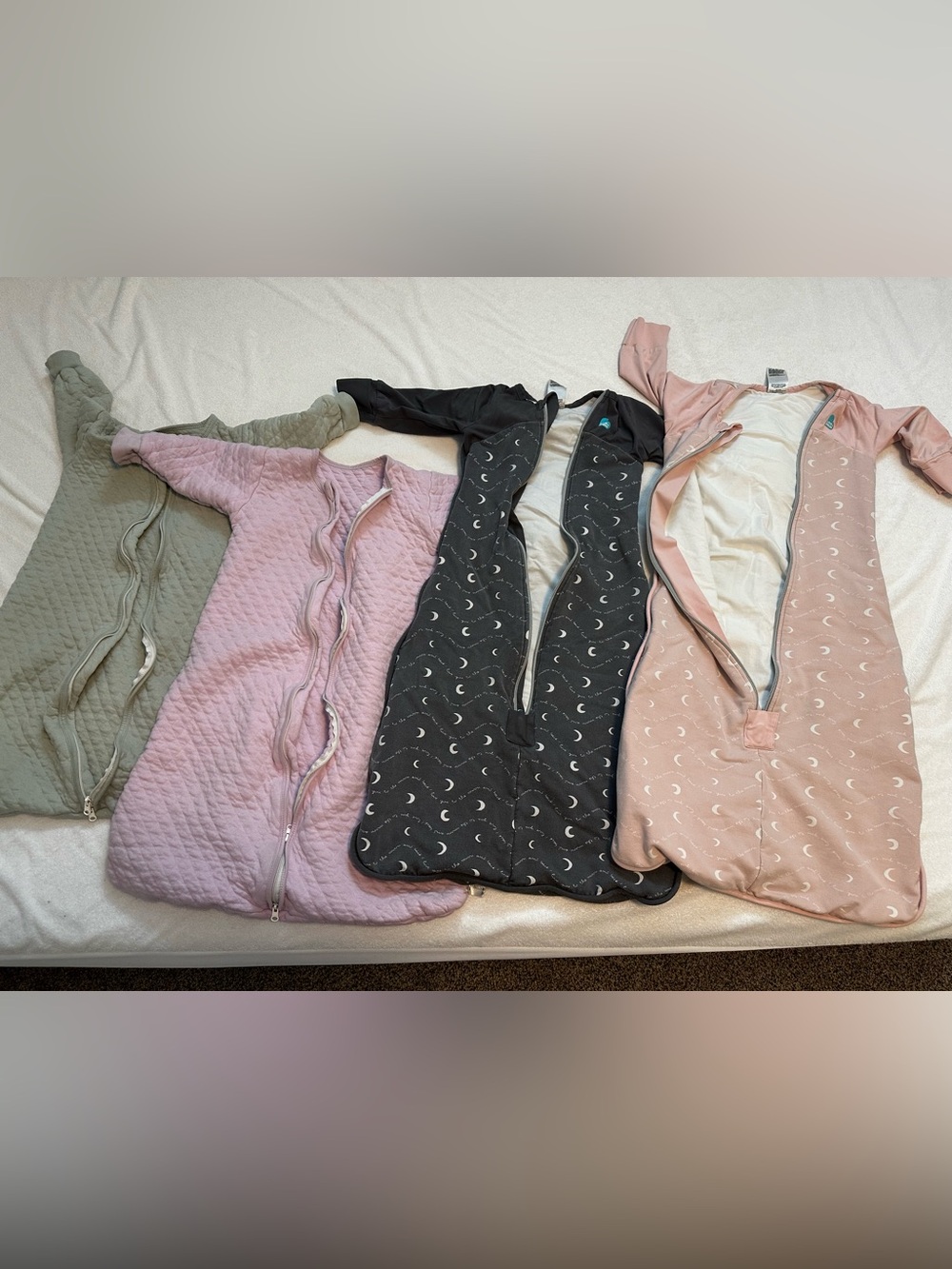 A lot of 6 infant sleep sacks